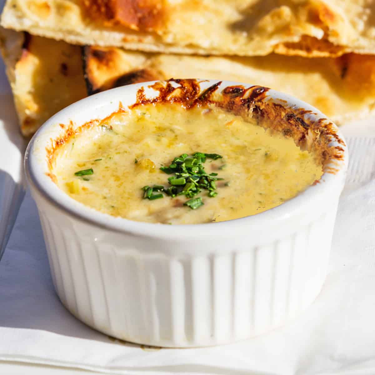 Easy hot bacon dip recipe at Happy Simple Living blog Artichoke dip with bacon and green chiles.