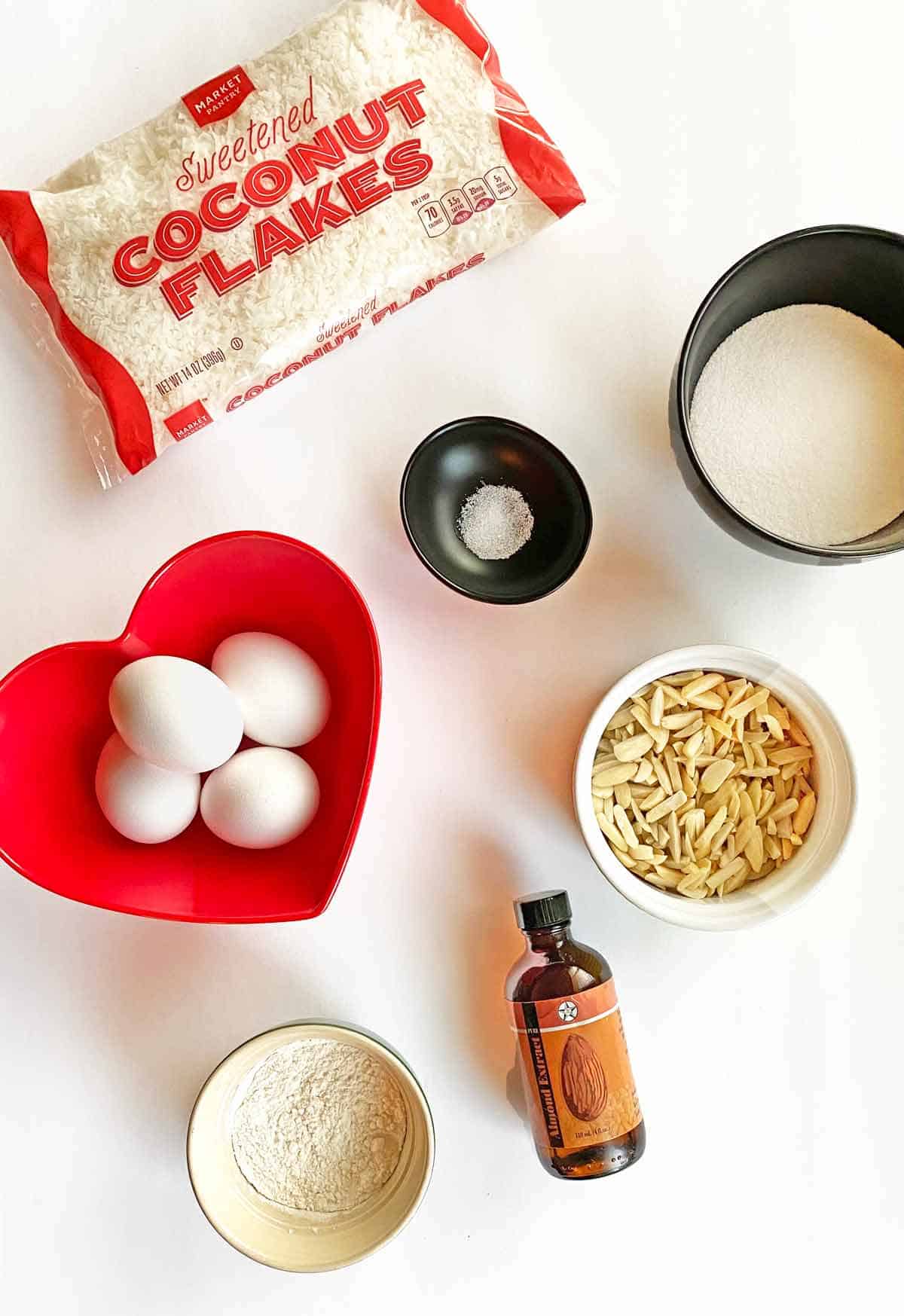 Coconut, eggs, salt, flour, sugar, slivered almonds and almond extract.