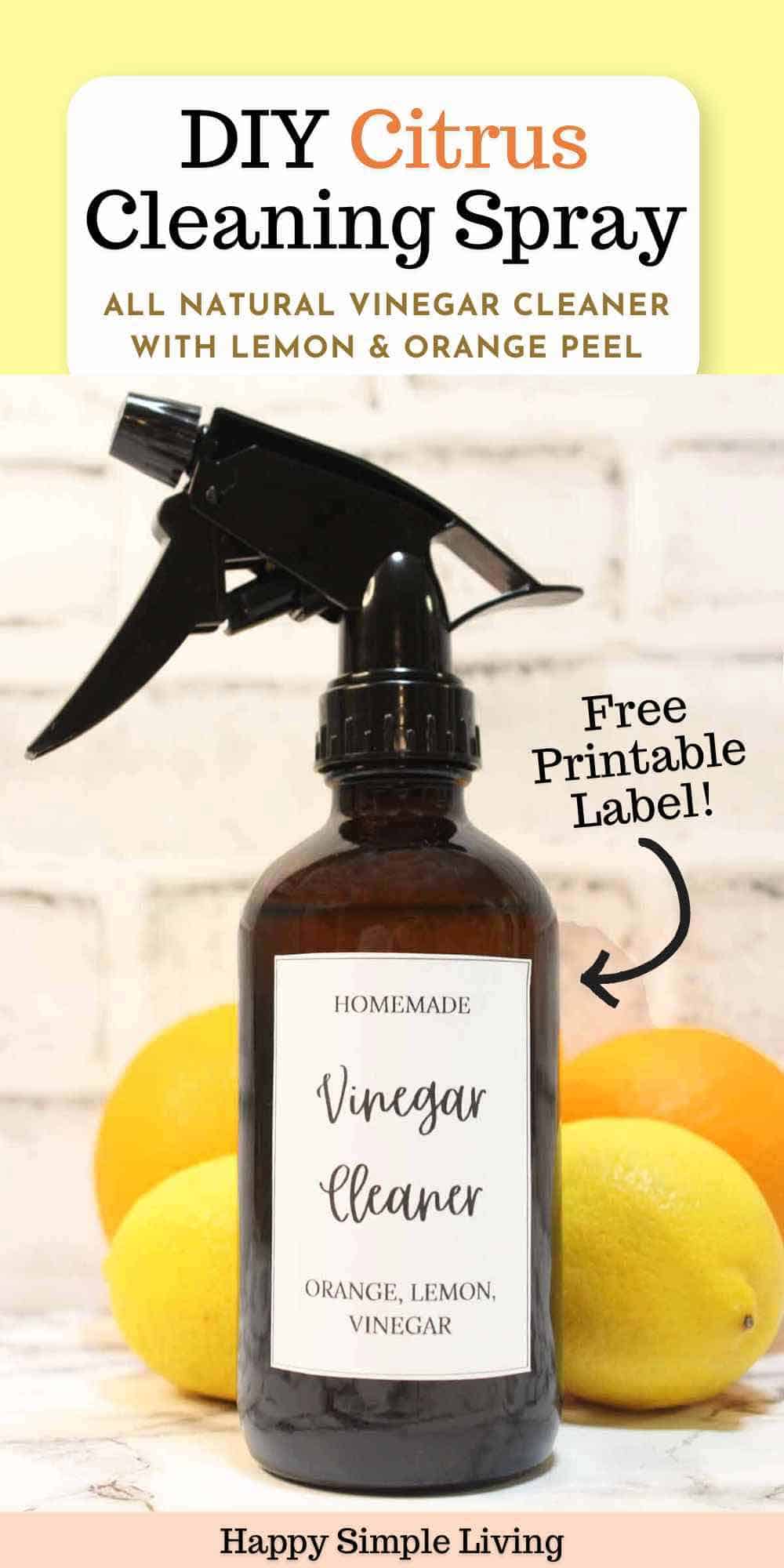A spray bottle filled with all natural citrus cleaner, with oranges and lemons in the background.