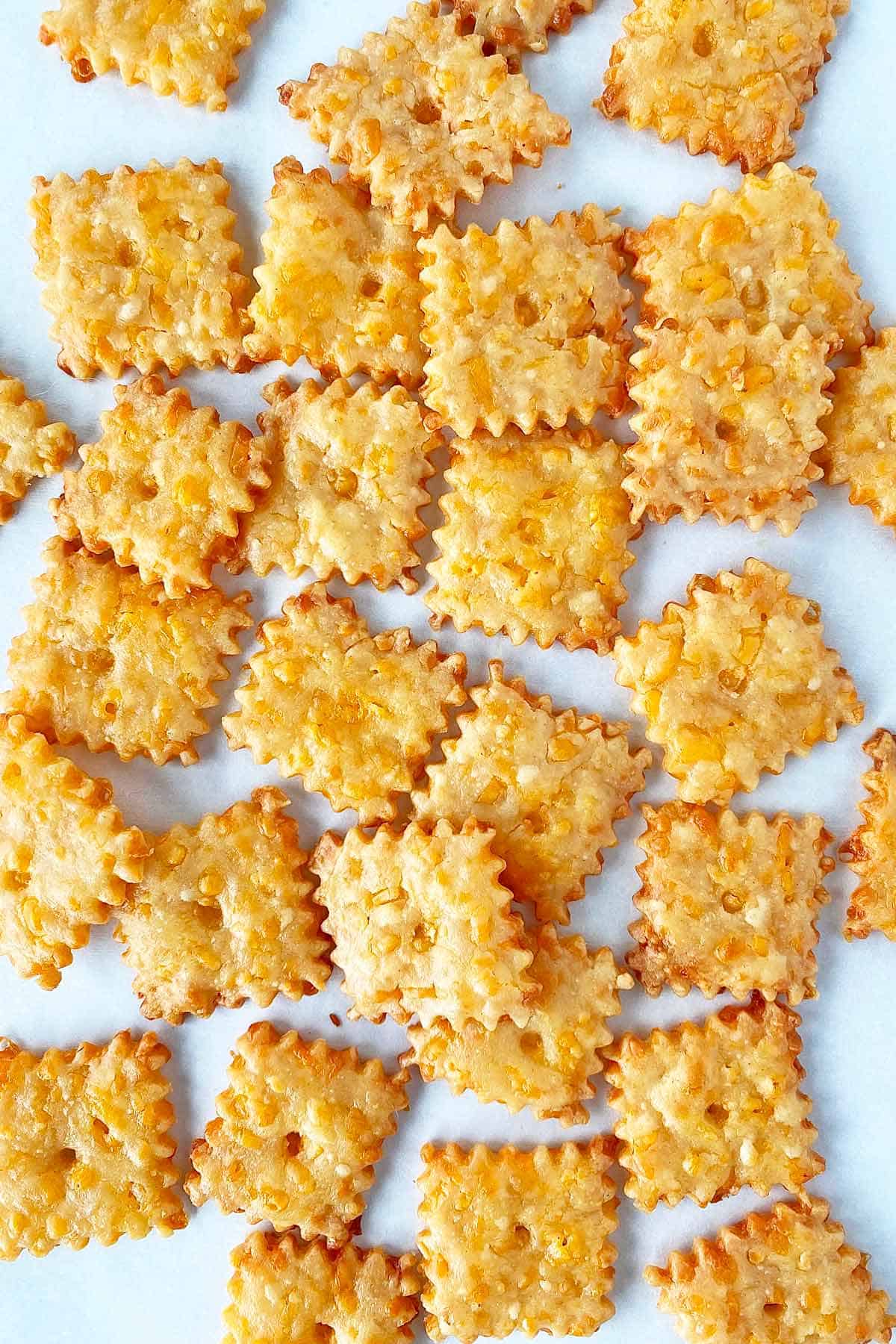 CrackersHead Baked homemade cheez it crackers ready for eating.