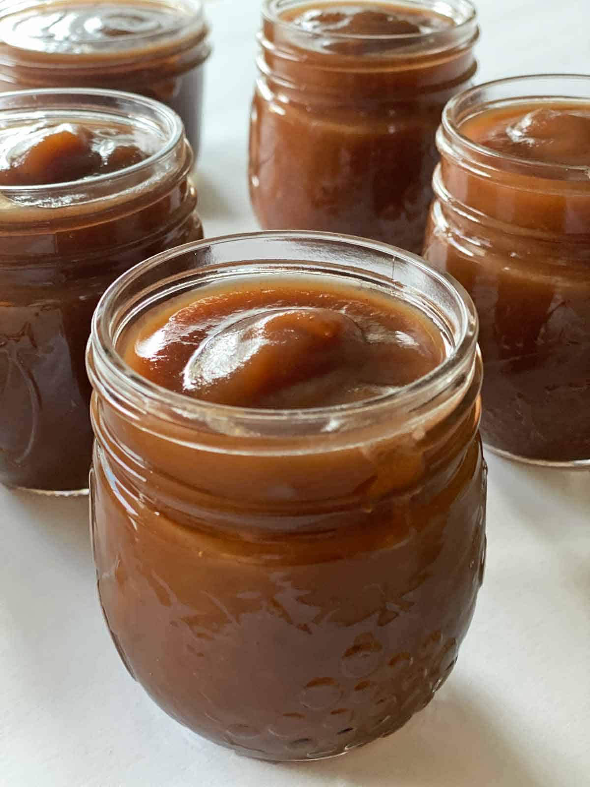 Five jars of finished apple butter.