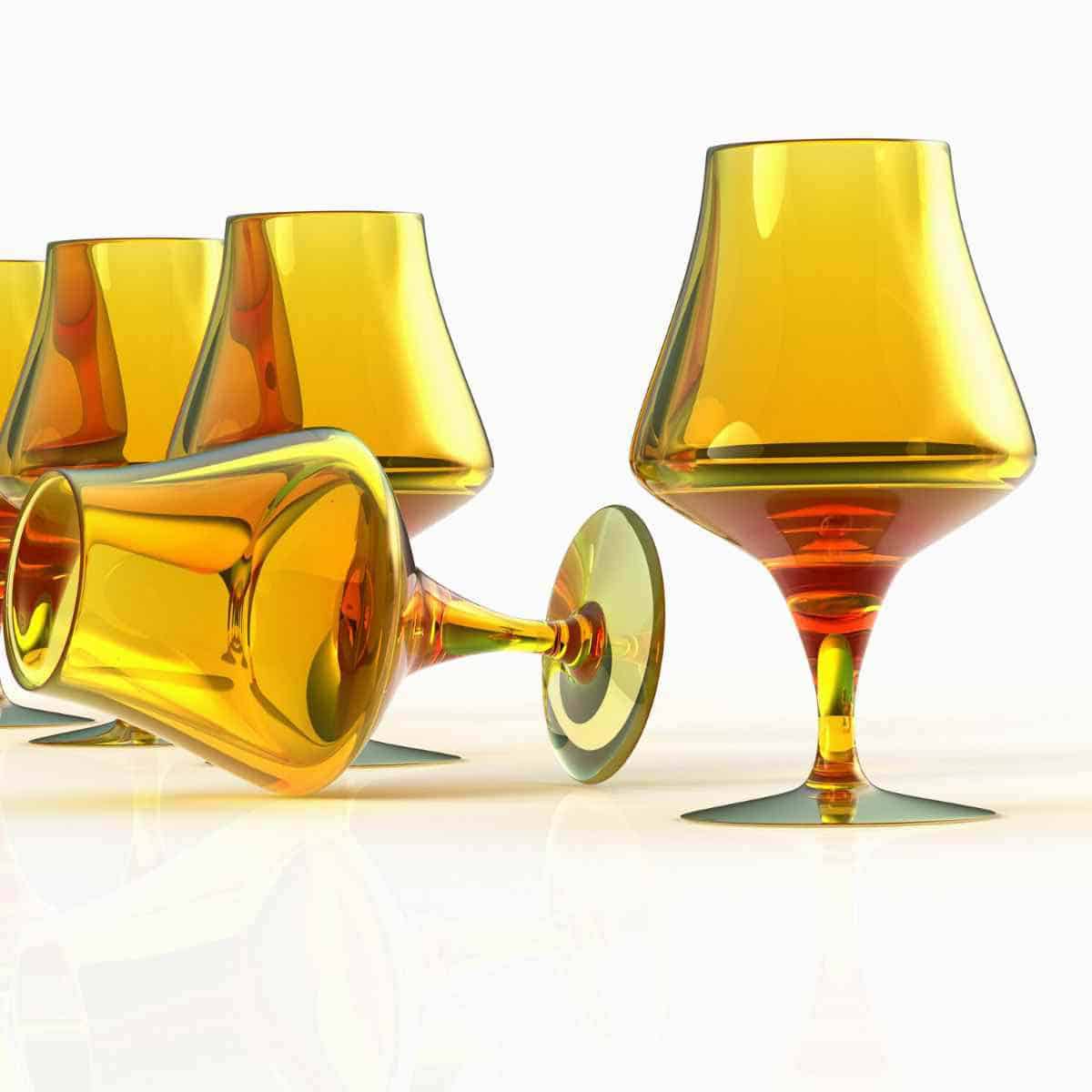 Four yellow glasses, sparkling clean.
