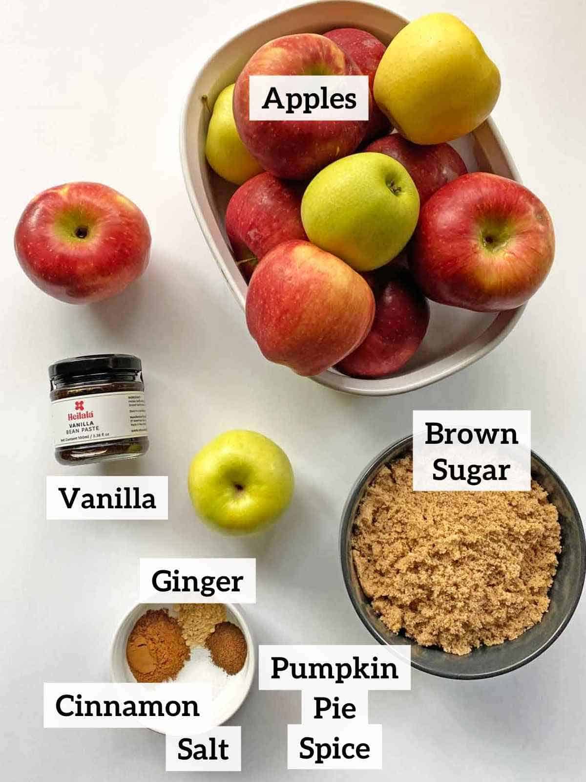 Apples, brown sugar, vanilla, salt and seasonings to make apple butter.