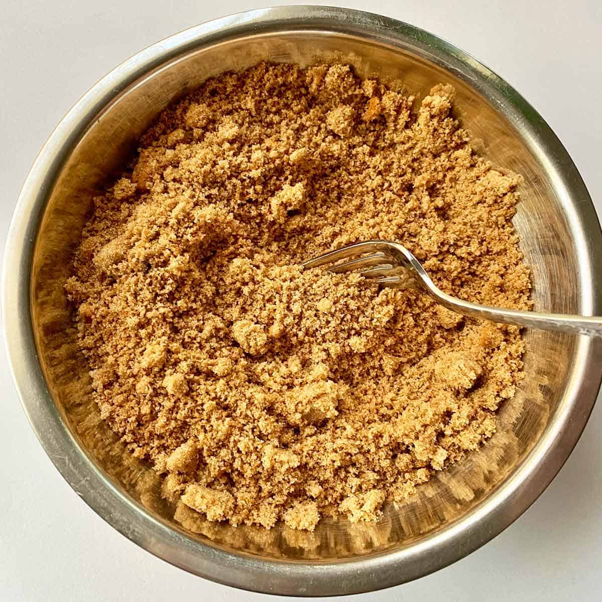 Whisking together the brown sugar, spices and salt.